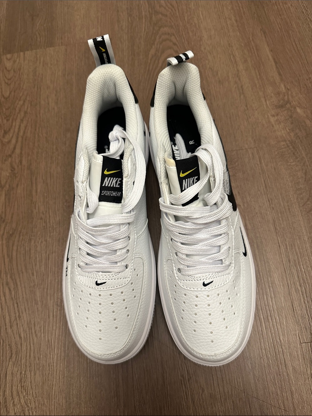 Nike White and Black Low-Top Sneakers with Yellow Accent